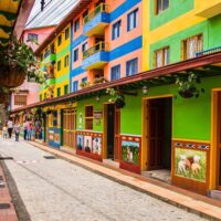 Visitors tasting tropical fruits Guatapé