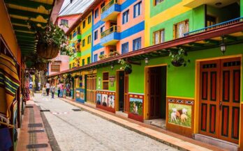 Visitors tasting tropical fruits Guatapé