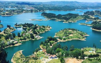Climbing El Peñol Rock with panoramic views on Guatapé day trip