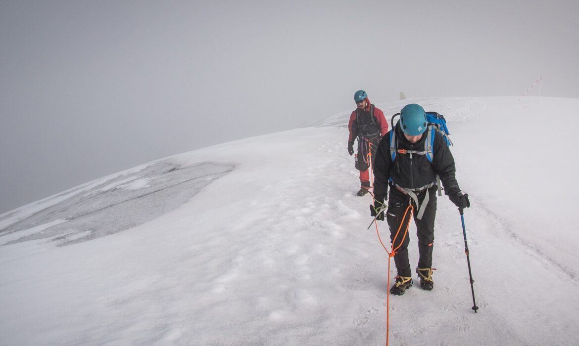 Hikers celebrating at Santa Isabel Summit with panoramic views