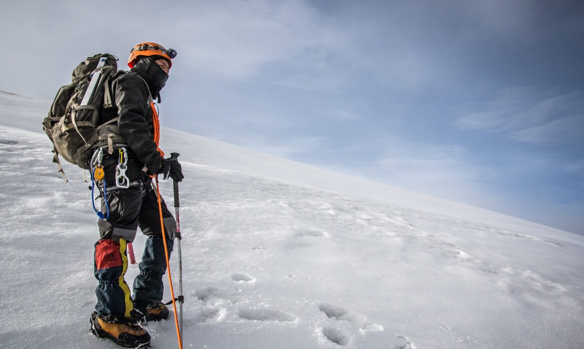Hiker resting at a viewpoint with the valley below
