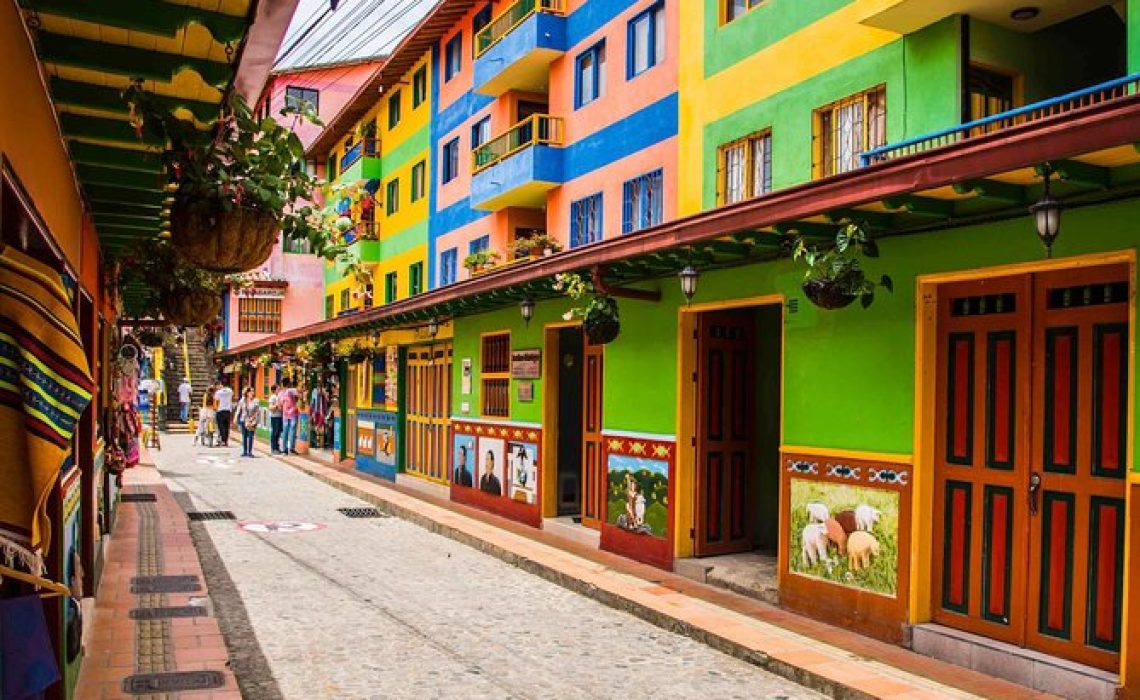 Visitors tasting tropical fruits Guatapé