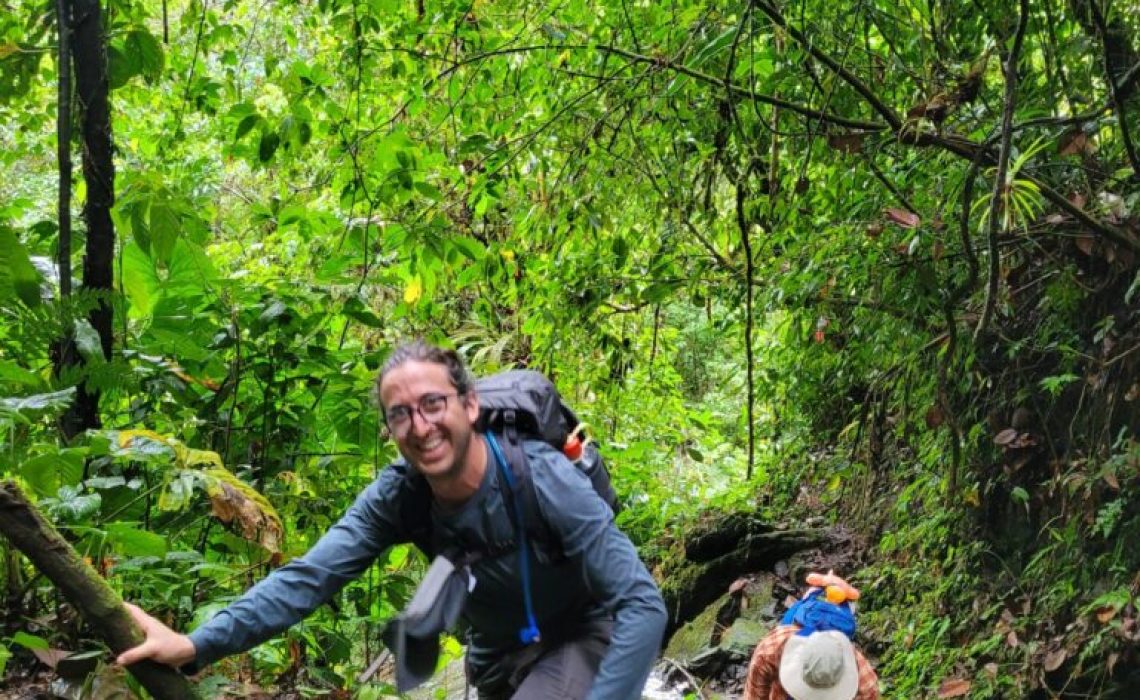 Guided jungle trekking group spotting wildlife in Colombia
