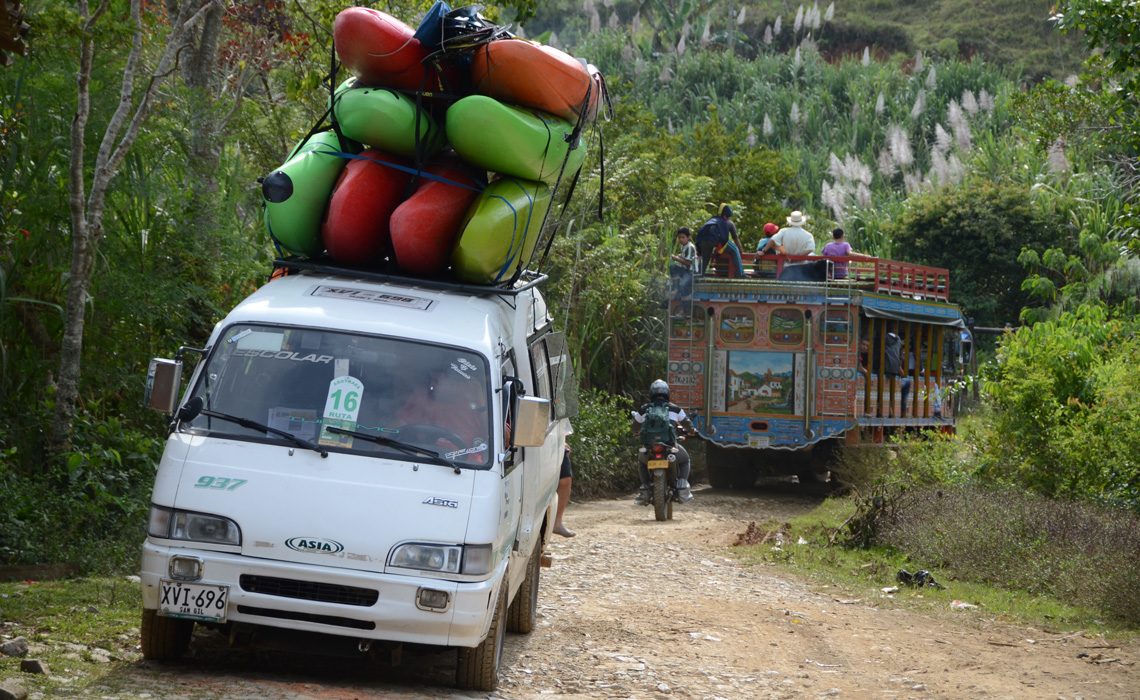 van with kayaks and chiva