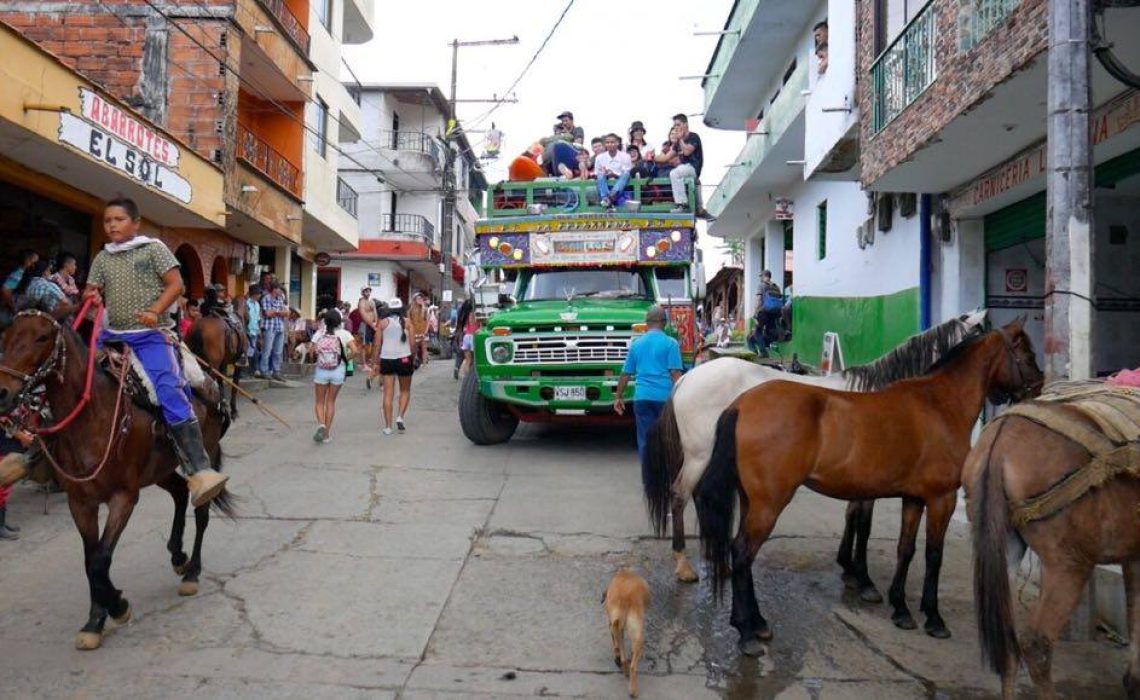 colombian chiva and horse