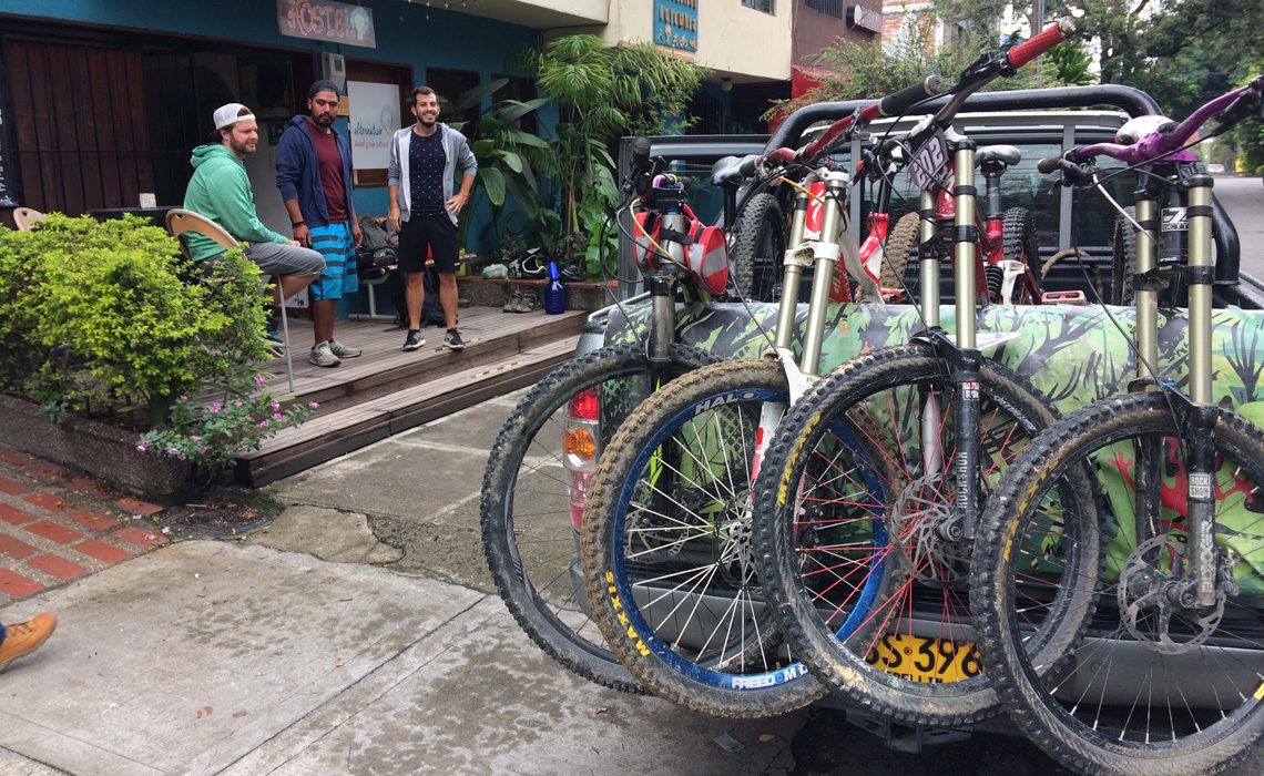mountain bikers outside hostel