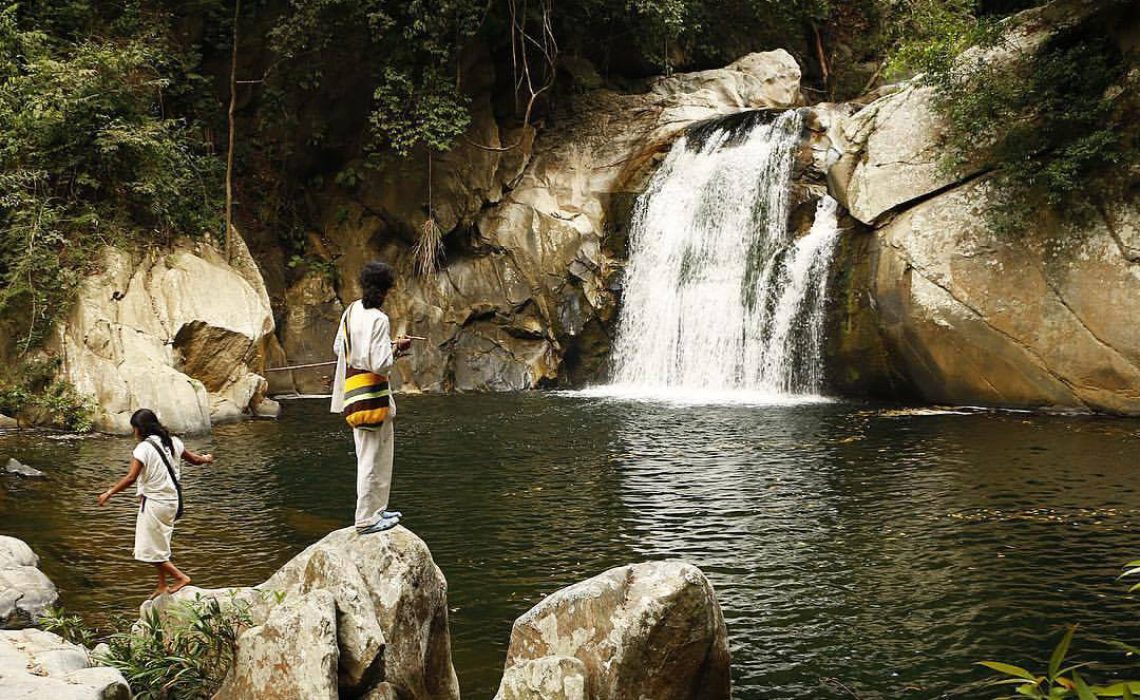 waterfalls and indigenous children